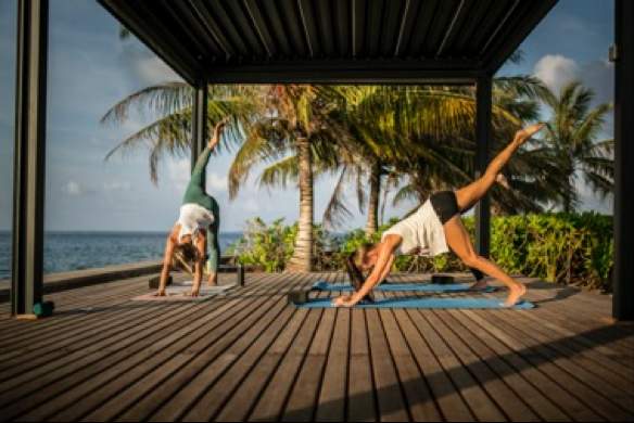 Guest Attending Yoga Classes at Holiday Inn Resort Maldives