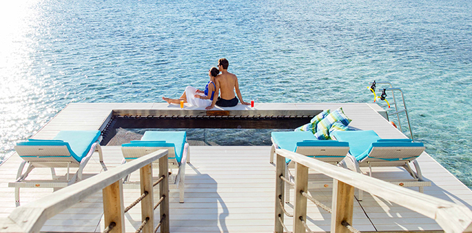 Couple at the Two Bedroom Overwater Pavilion