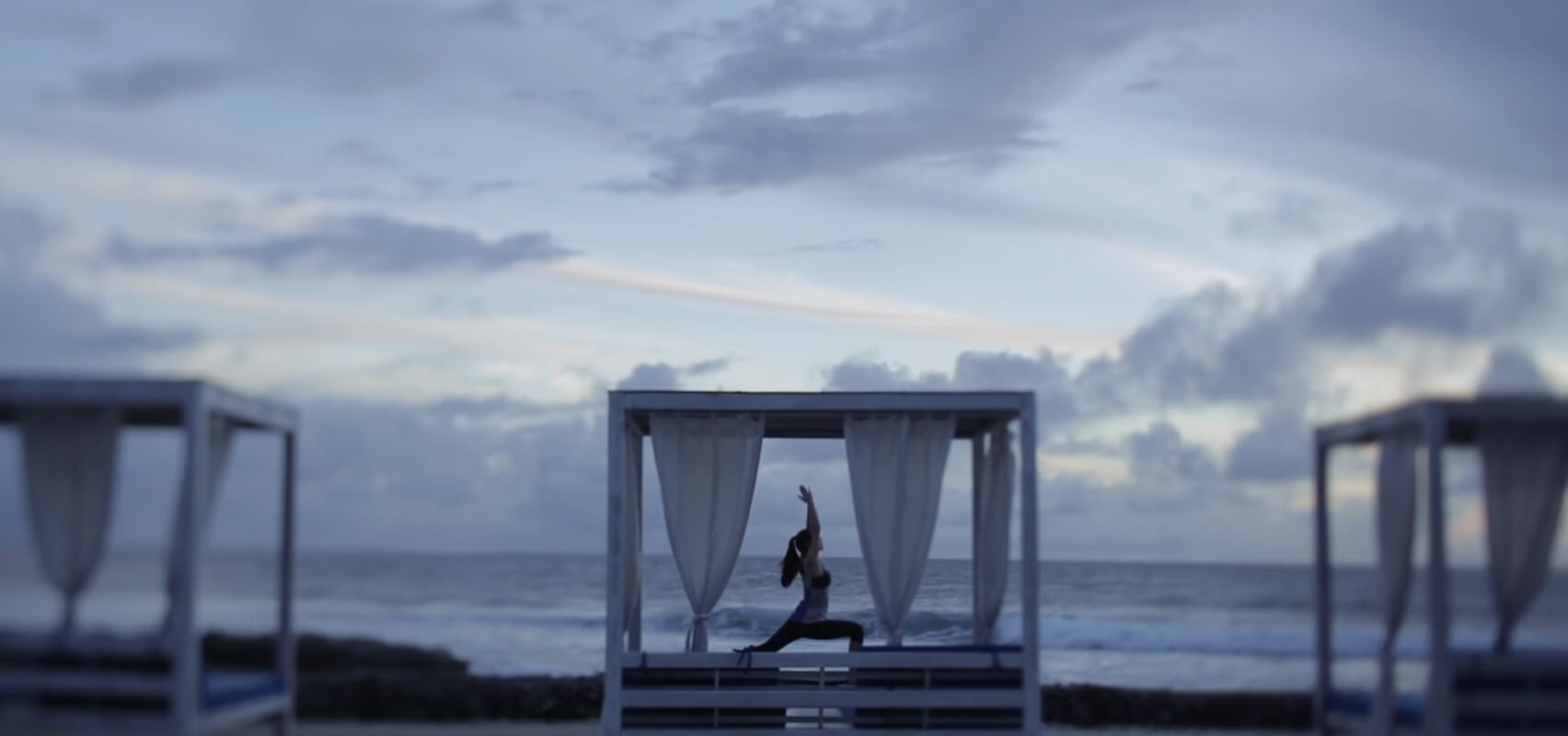 Girl Involved in yoga at Holiday Inn Resorts Maldives