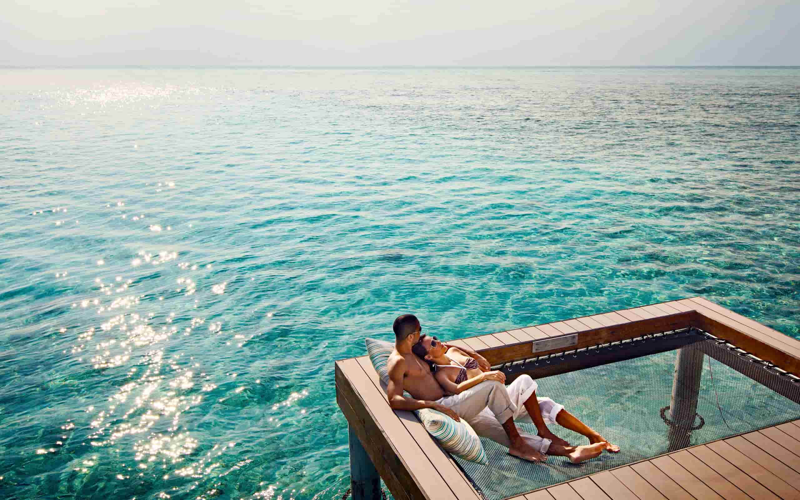 Guest by the Sundeck in Overwater Villa