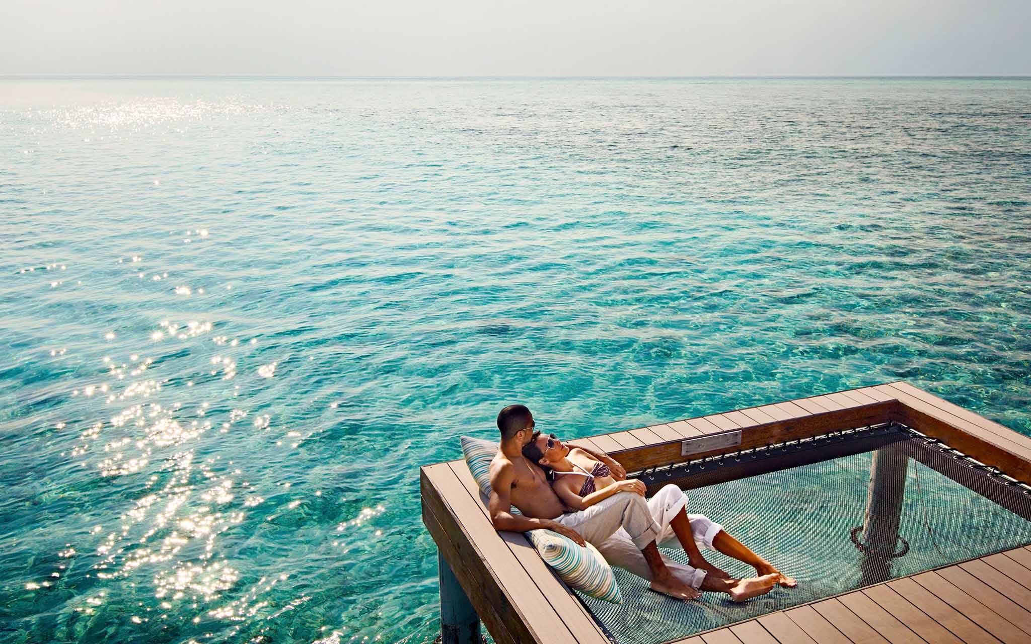 Couple Relaxing at Holiday Inn Resorts Maldives
