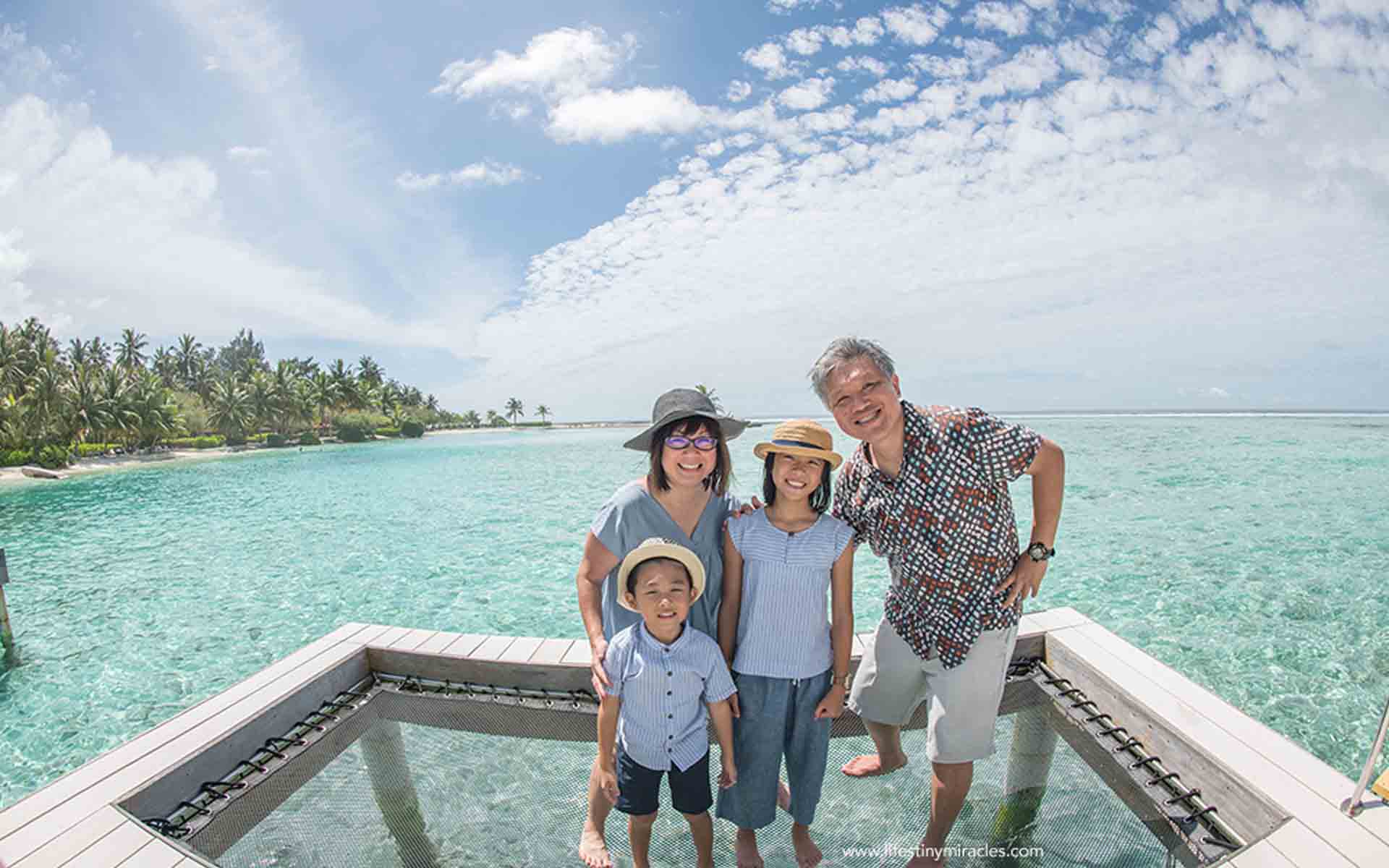 Family Guests Enjoying in an Overwater Pavilion in the Maldives