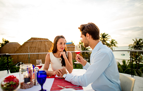 Guests Enjoying Private Dining at Holiday Inn Resort Maldives