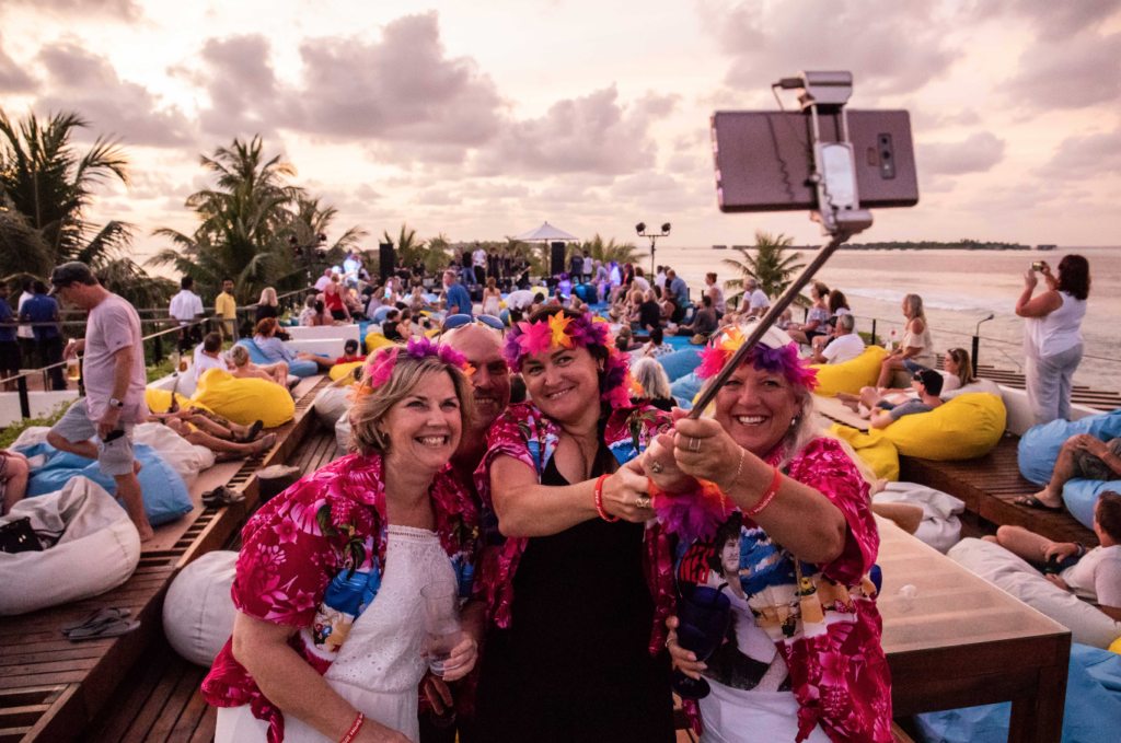 Guests at the Sunset Deck in Holiday Inn Resort Maldives