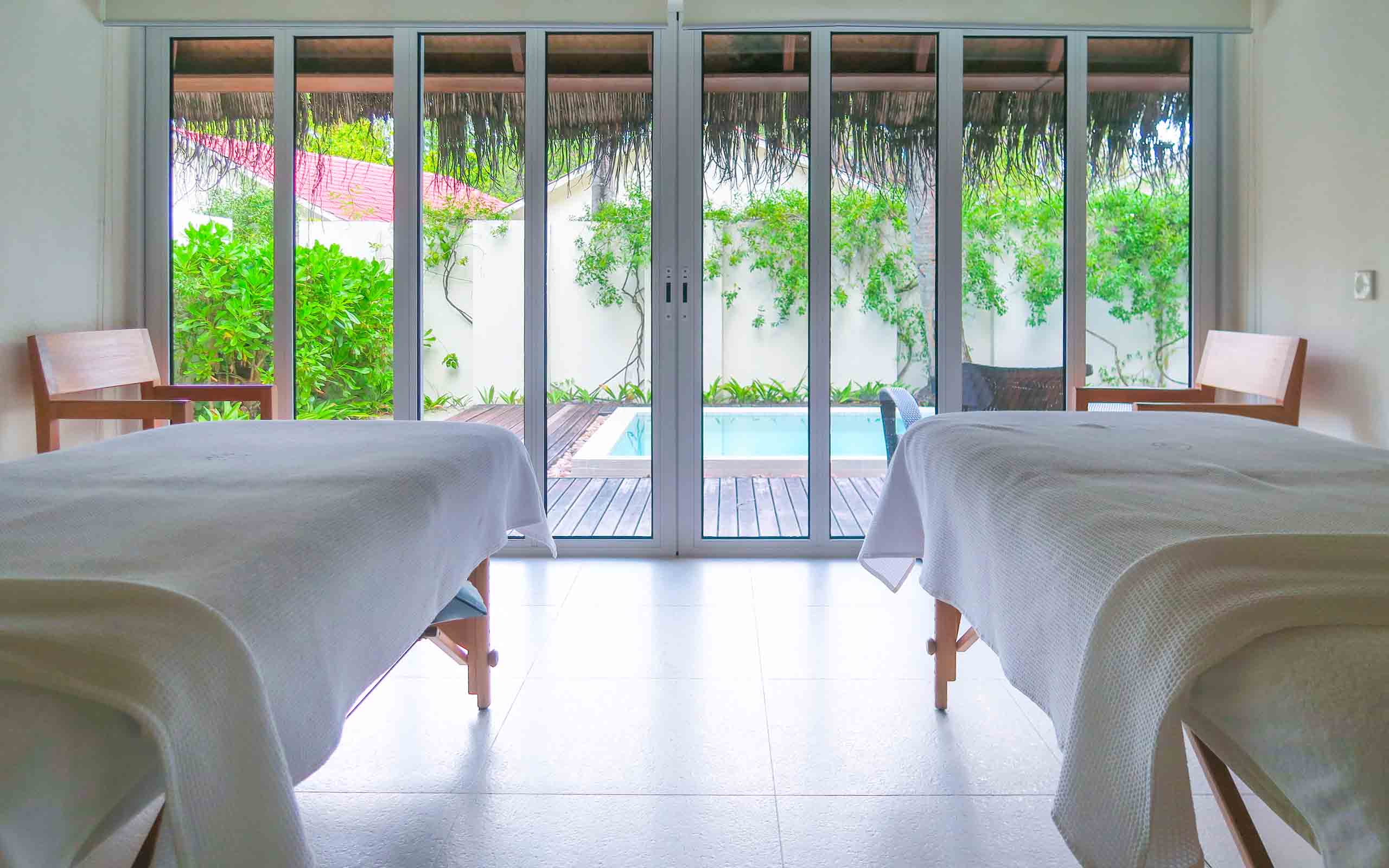 Guest Engaged in Yoga Activities at Holiday Inn Resorts Maldives